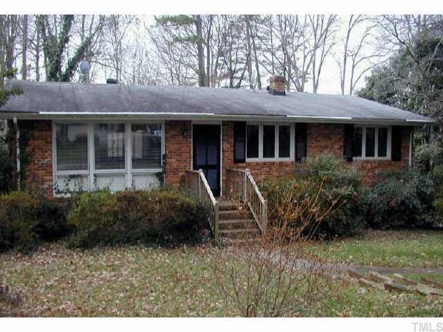 3203 Childers Street Raleigh, NC 27612 - Photo 1 of 1 a view of a house with garden and plants