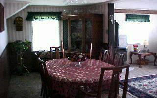370 Noye Road Tieton, WA 98947 - Photo 4 of 7 a view of a dining table and chairs in the patio