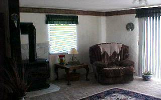370 Noye Road Tieton, WA 98947 - Photo 5 of 7 a living room with furniture and a window