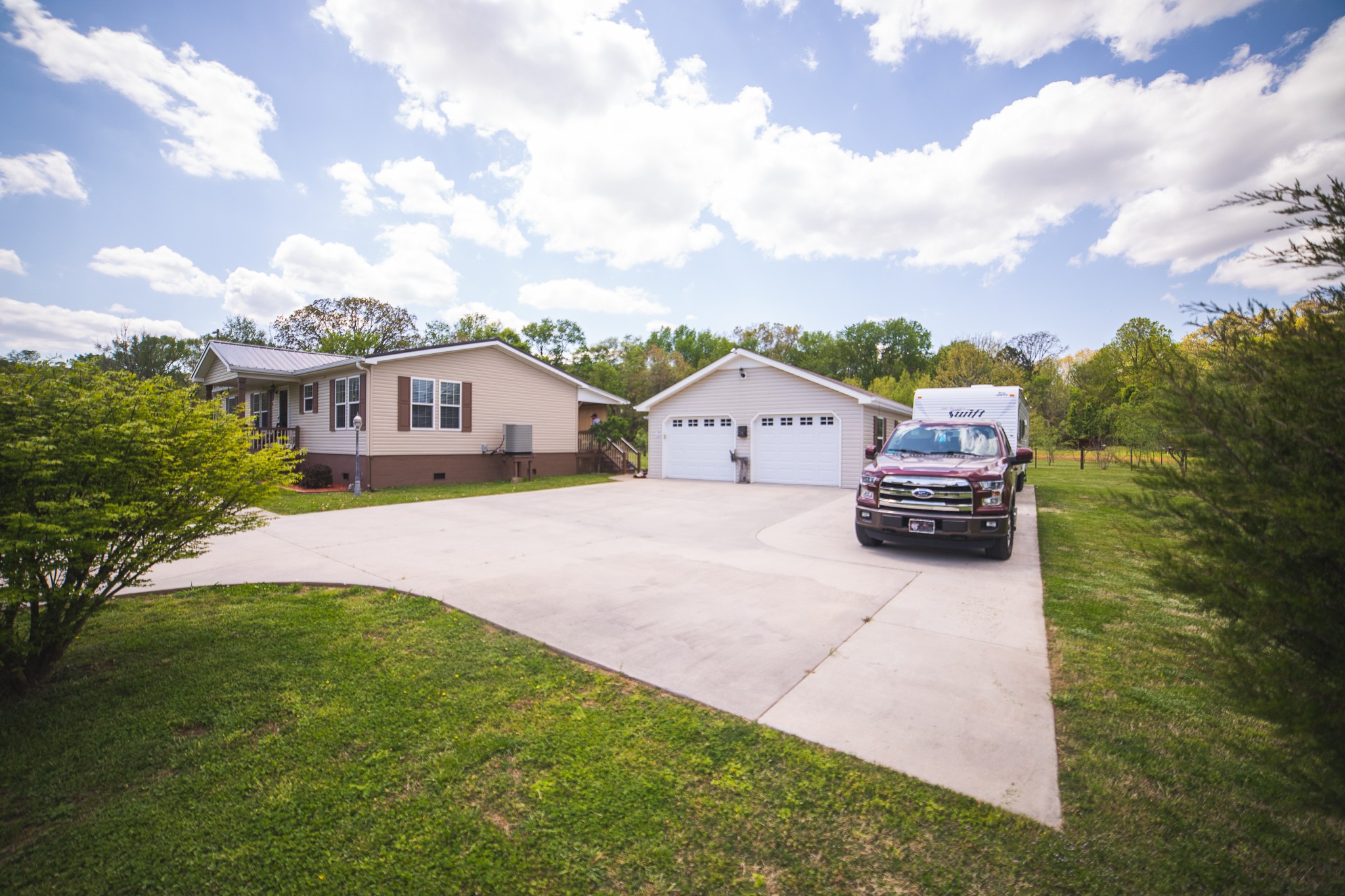 373 Church Road Decherd, TN 37324 - Photo 9 of 65 a view of house with backyard and seating area