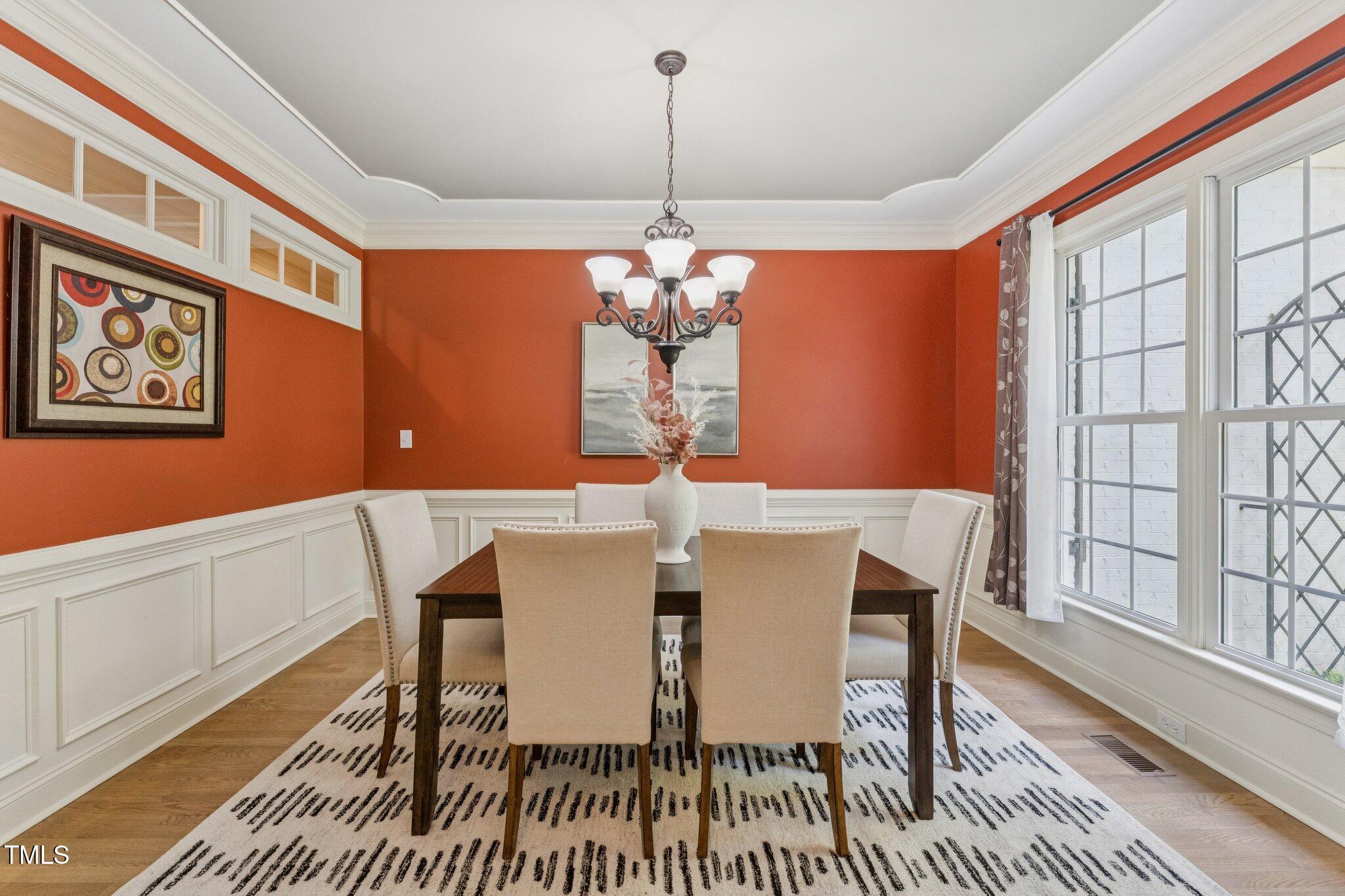 3421 Griffice Mill Road Raleigh, NC 27610 - Photo 5 of 48 a view of a dining room with furniture window and wooden floor