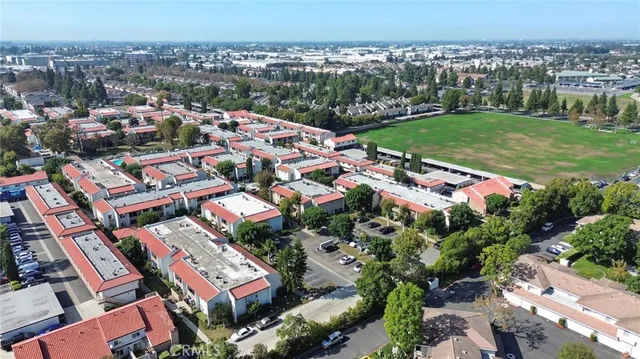 an aerial view of a house with a garden
