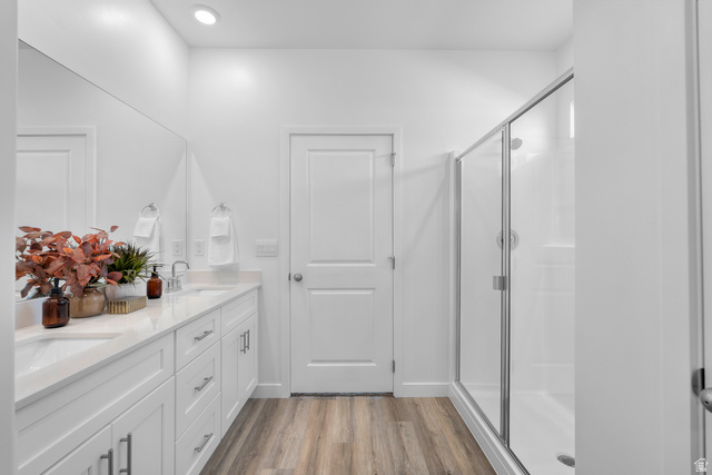 1589 South Fins Road, Unit 4178 Washington, UT 84780 - Photo 26 of 30 Bathroom featuring a dual vanity with white cabinetry, light-toned countertops, and dual undermount sinks