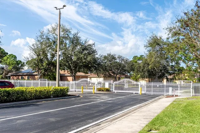 an aerial view of a house with a swimming pool