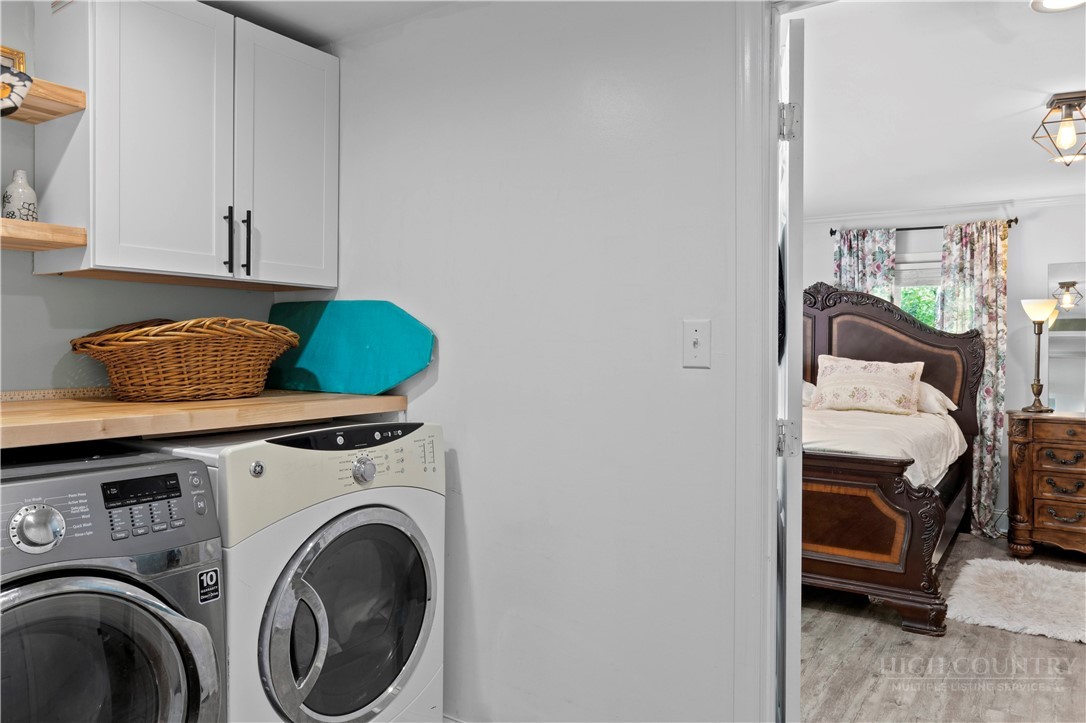 142 Pioneer Road Harmony, NC 28634 - Photo 29 of 49 a utility room with dryer and washer