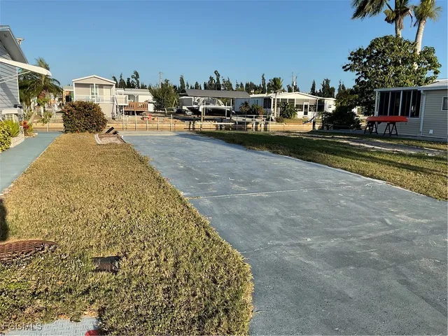 a view of a backyard of a house