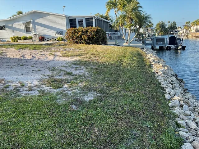 a large building with trees in front of it