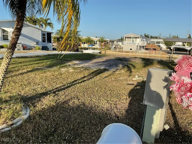 a view of swimming pool yard and lake view