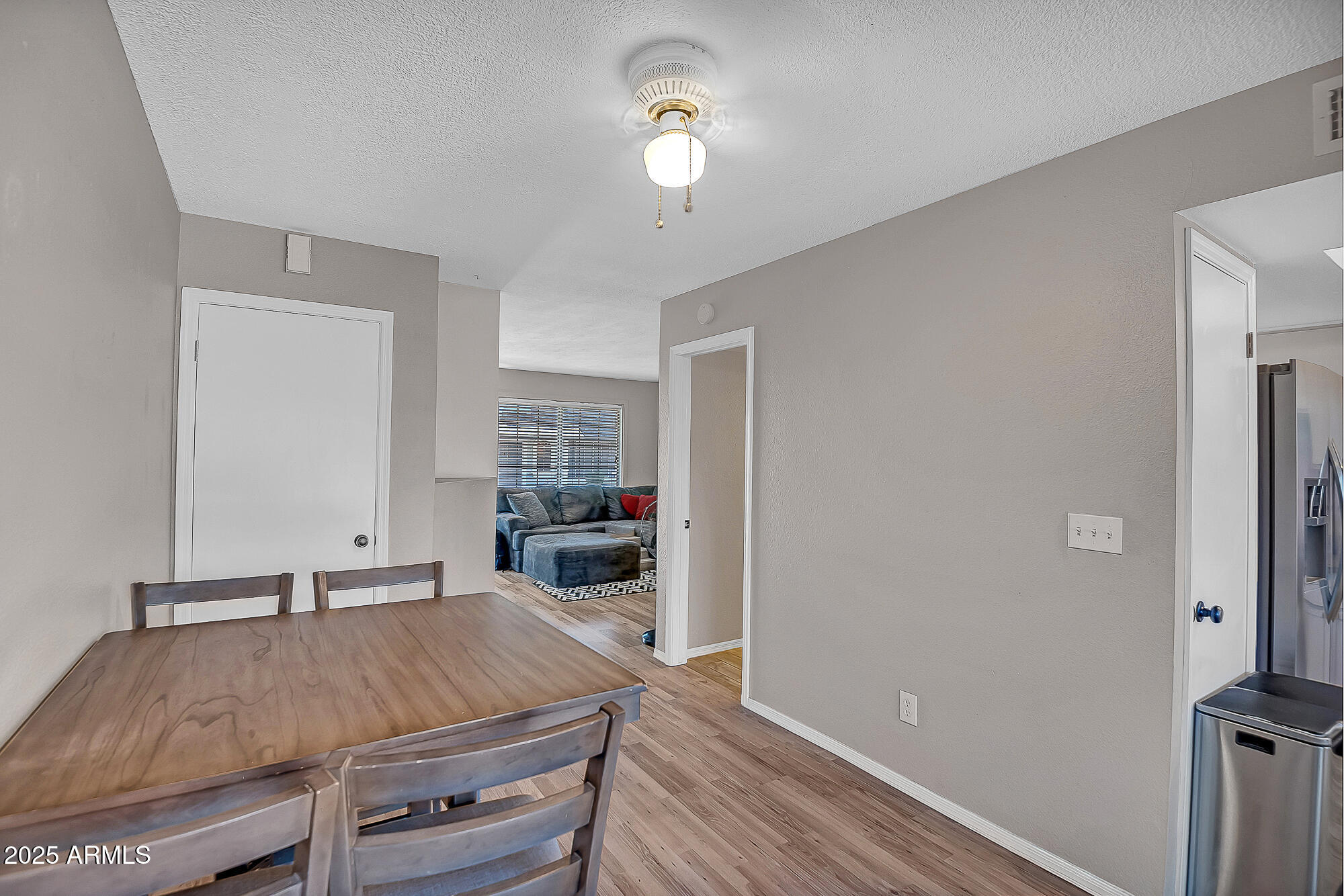 10100 North 89th Avenue, Unit 66 Peoria, AZ 85345 - Photo 17 of 32 Dining looking towards Living Room