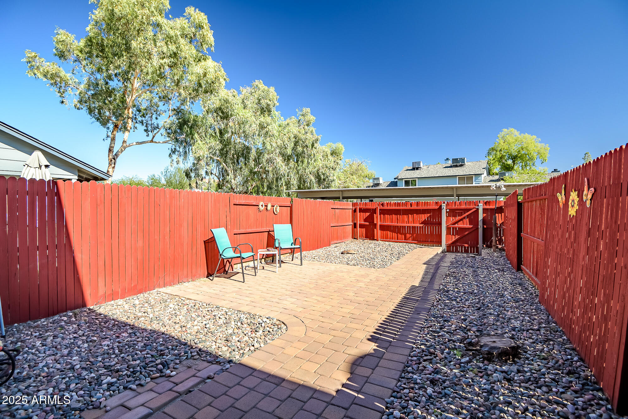 10100 North 89th Avenue, Unit 66 Peoria, AZ 85345 - Photo 22 of 32 Backyard leading to parking