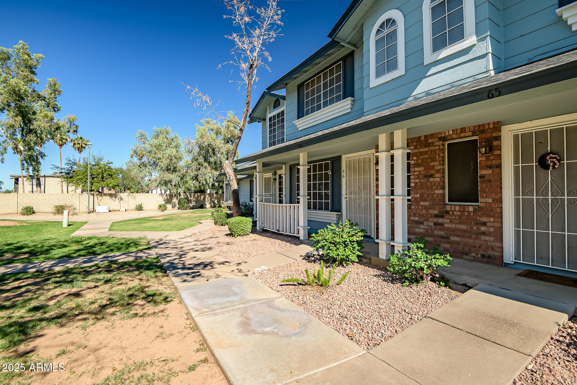 10100 North 89th Avenue, Unit 66 Peoria, AZ 85345 - Photo 32 of 32 Front of home