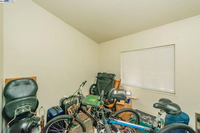 a kitchen that has a sink and a stove top oven