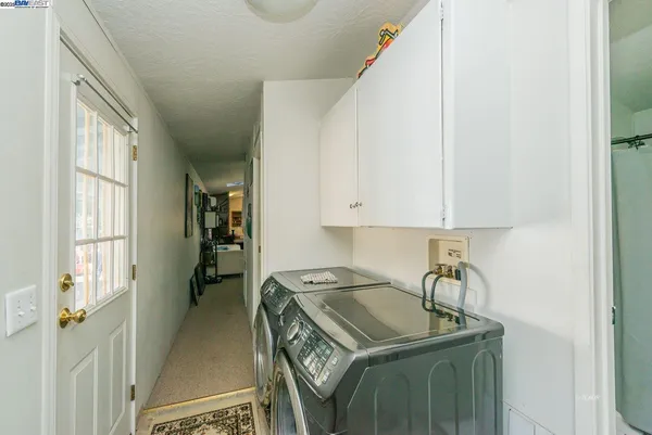 a bathroom with a sink vanity and a mirror