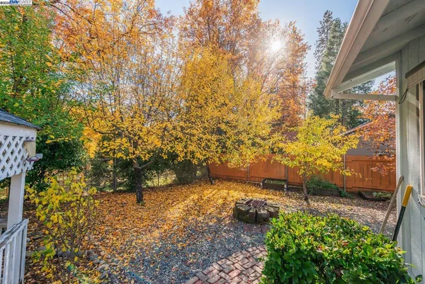 a view of a pathway in front of house