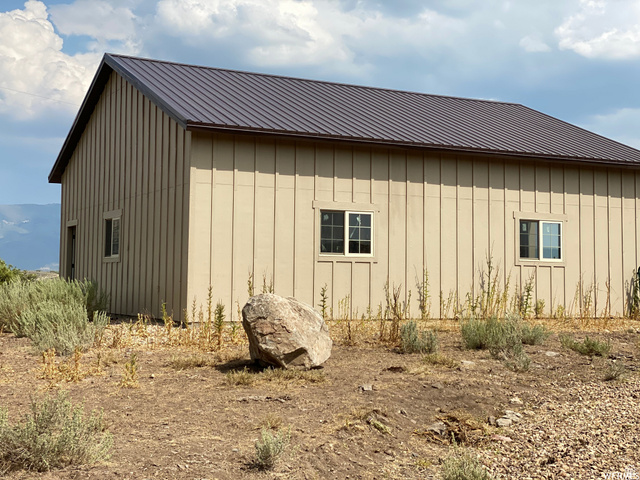 60 Corral Road, Unit 60 Kamas, UT 84036 - Photo 10 of 11 View of home's exterior featuring board and batten siding and a metal roof
