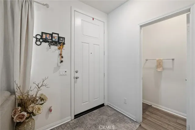 a view of a bathroom with a potted plant