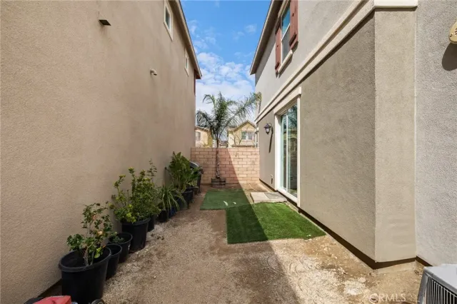 a swimming pool with yard and outdoor seating