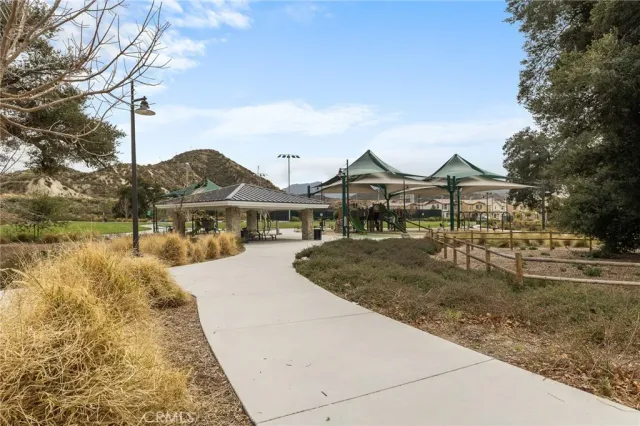 a view of a swimming pool with a sitting area