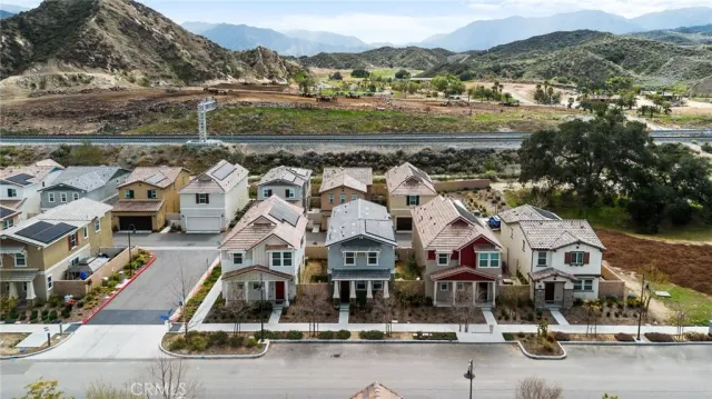 an aerial view of a house with a garden