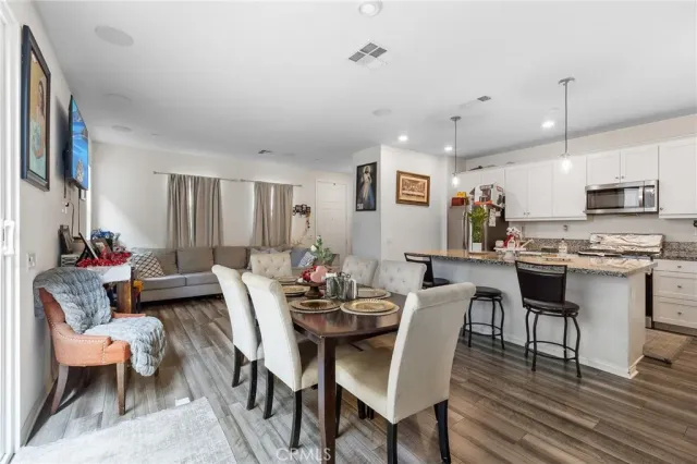a view of a dining room with furniture
