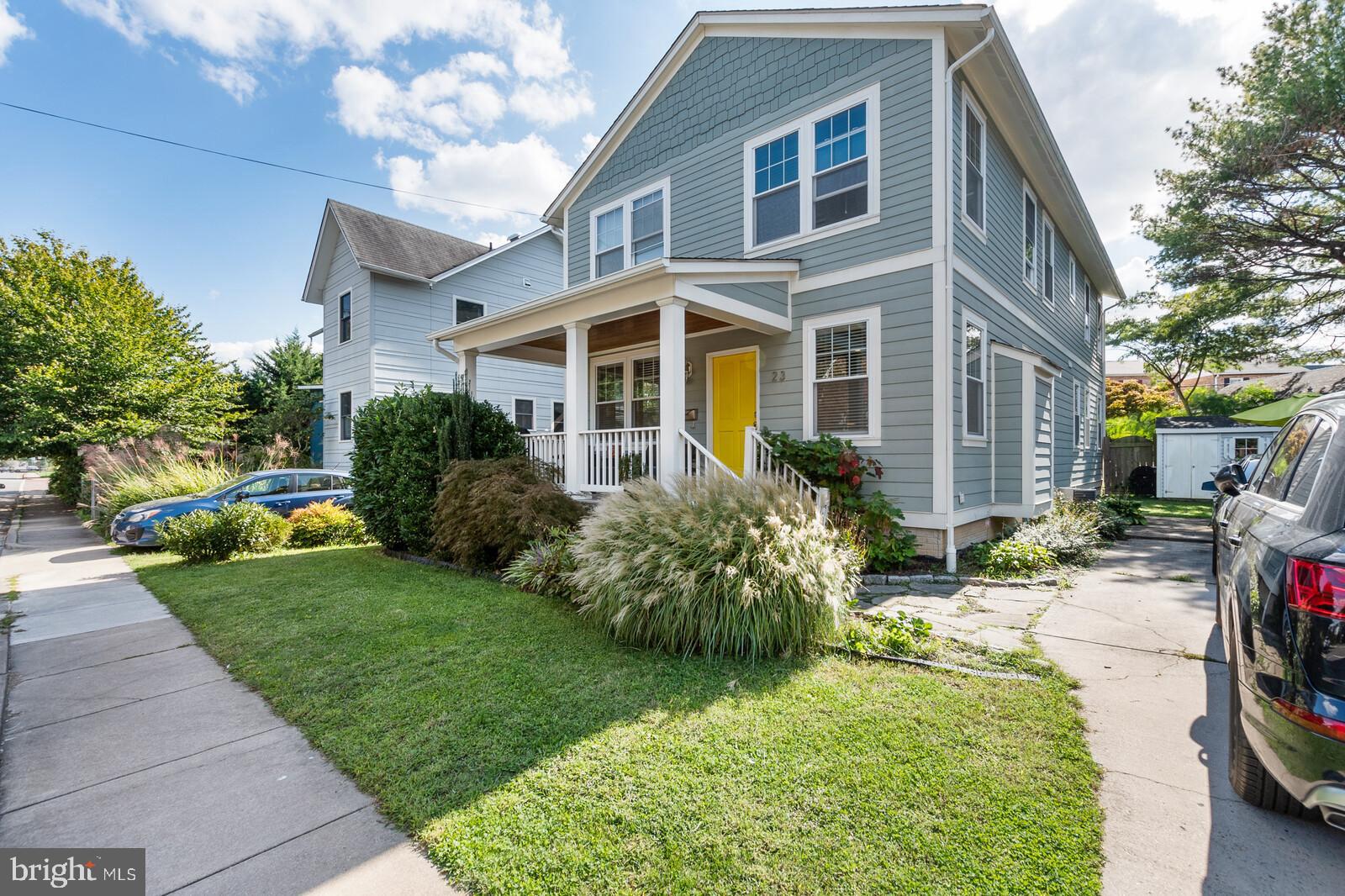 23 East Braddock Road Alexandria, VA 22301 - Photo 2 of 29 a front view of a house with garden