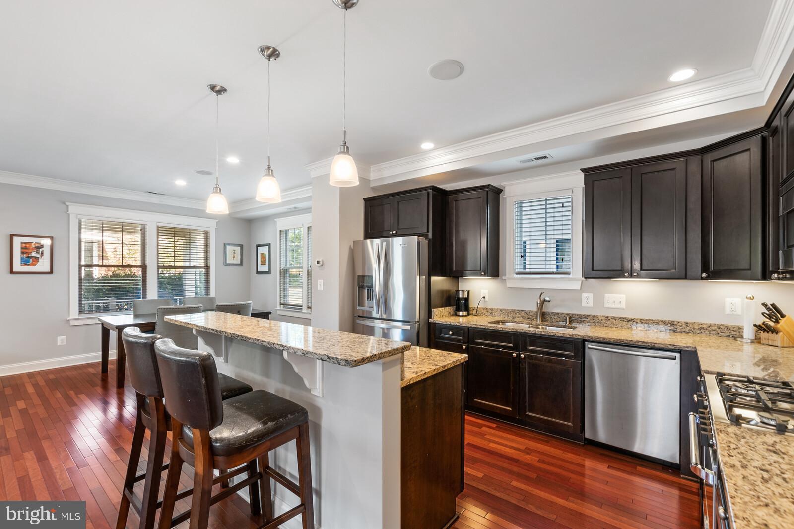23 East Braddock Road Alexandria, VA 22301 - Photo 12 of 29 a kitchen with lots of counter top space and stainless steel appliances