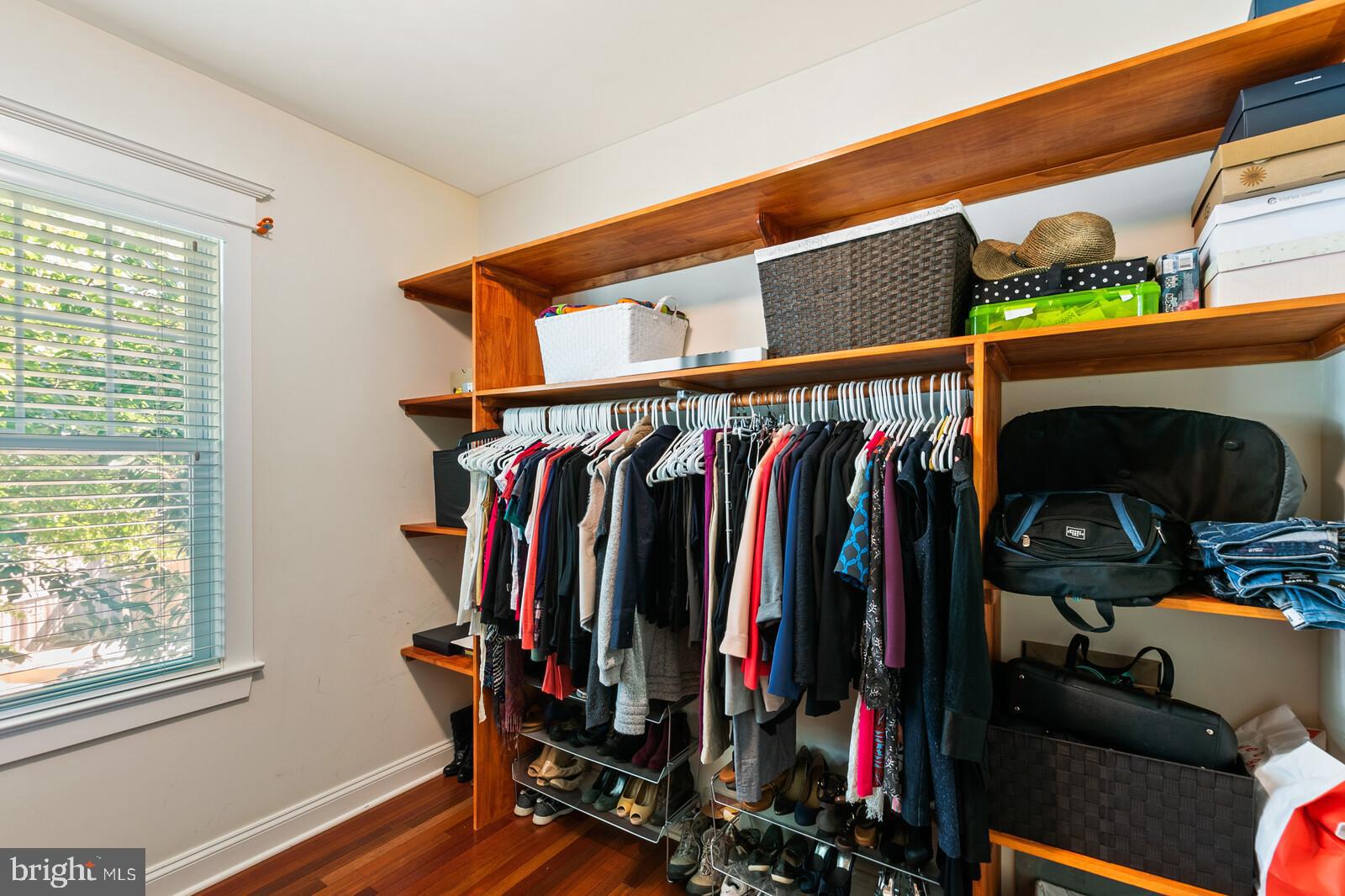 23 East Braddock Road Alexandria, VA 22301 - Photo 22 of 29 a view of walk in closet with clothes and shoes