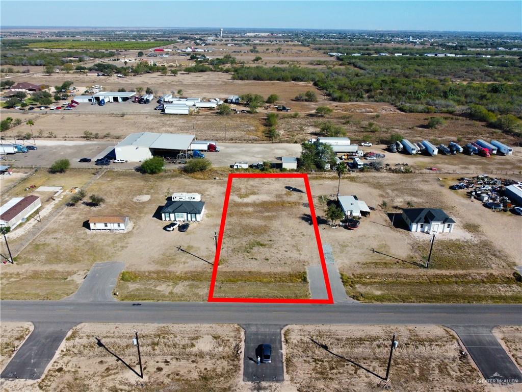 7708 West Mile 5 Road Mission, TX 78574 - Photo 6 of 6 an aerial view of residential houses with outdoor space