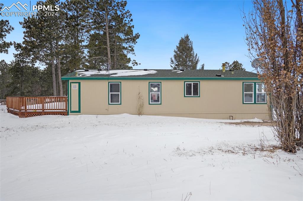 16625 Roller Coaster Road Colorado Springs, CO 80921 - Photo 41 of 44 a view of garage and yard