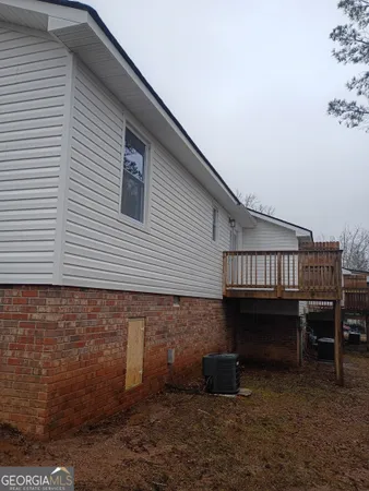 a view of a house with a deck