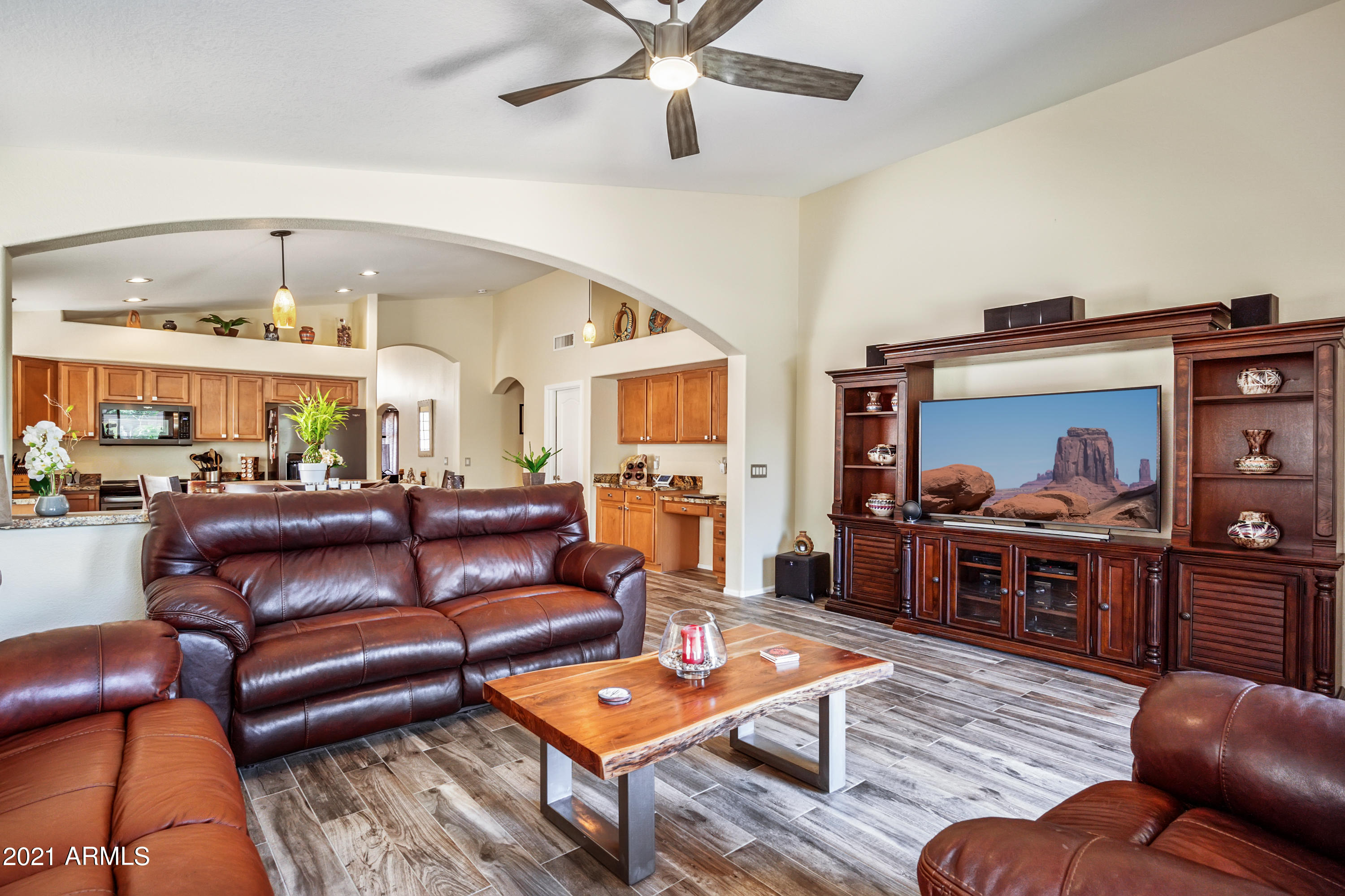 28726 North Nobel Road Phoenix, AZ 85085 - Photo 5 of 14 a living room with furniture kitchen view and a large window