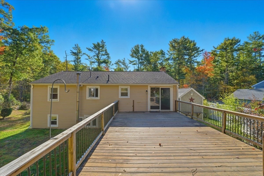 179 Hedges Pond Road Plymouth, MA 02360 - Photo 6 of 18 a view of a house with a deck
