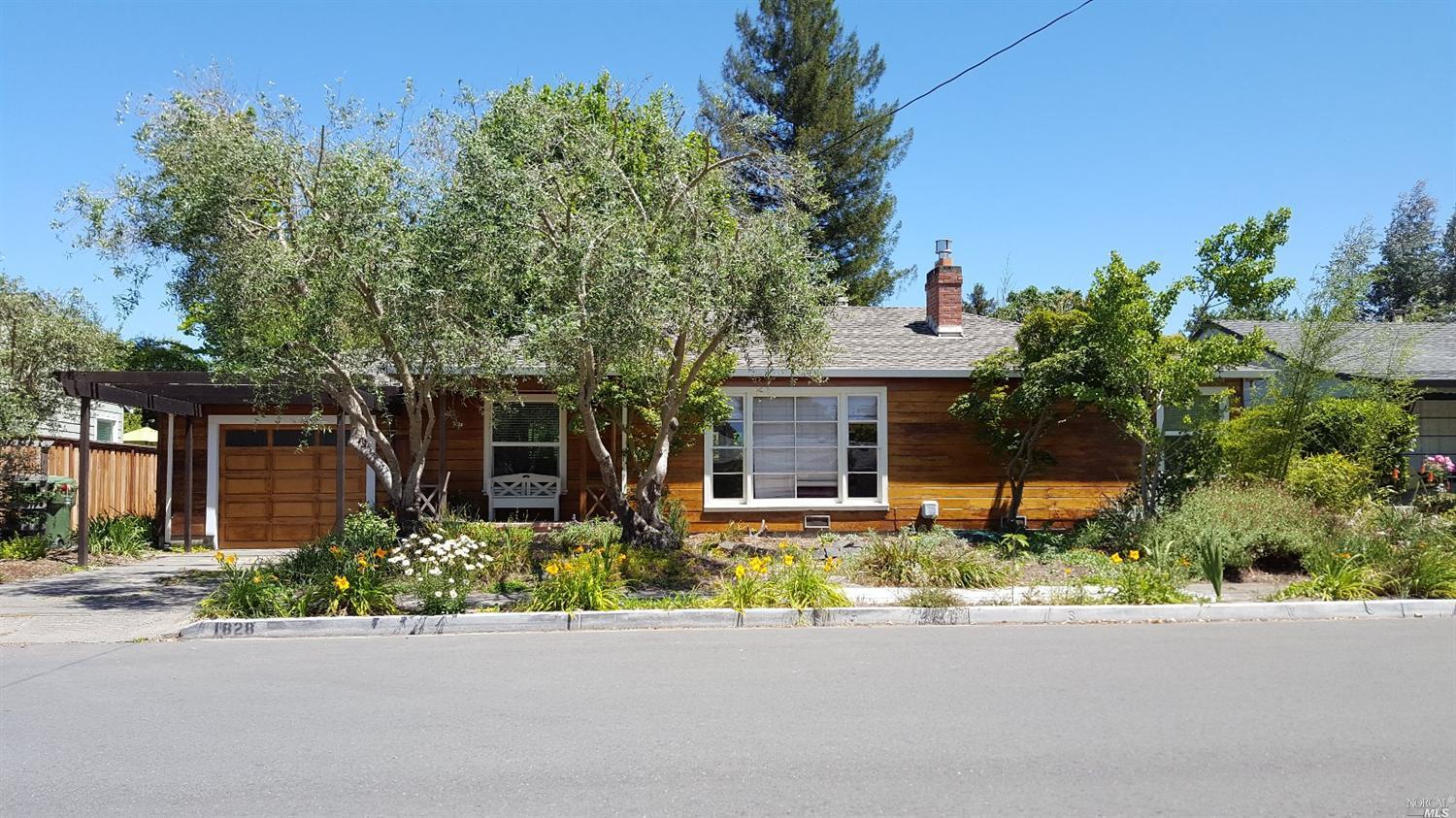 1828 Beaver Street Santa Rosa, CA 95404 - Photo 1 of 1 front view of a house with a small yard