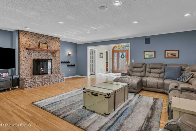 a living room with furniture and a table