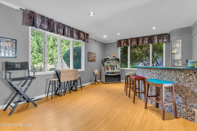 a bathroom with a granite countertop sink mirror and double