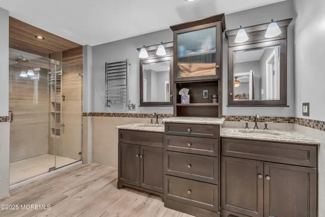 a spacious bedroom with a bed and a desk