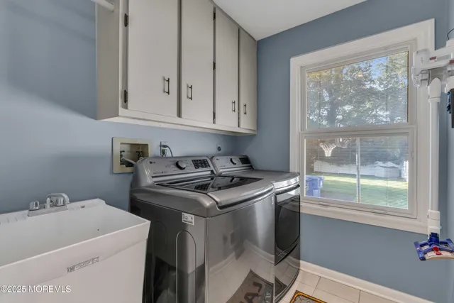 a bedroom with a bed and a tv