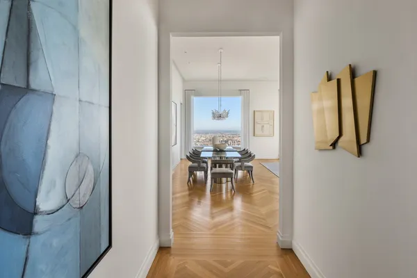 a view of living room with furniture and a table