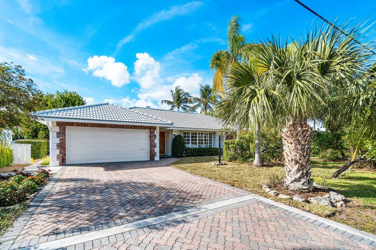 275 Northeast Olive Way Boca Raton, FL 33432 - Photo 1 of 41 001-275NortheastOliveWay-BocaRaton-FL-33