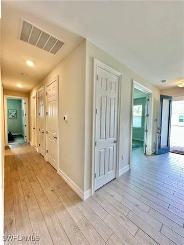 a living room with a couch and a rug