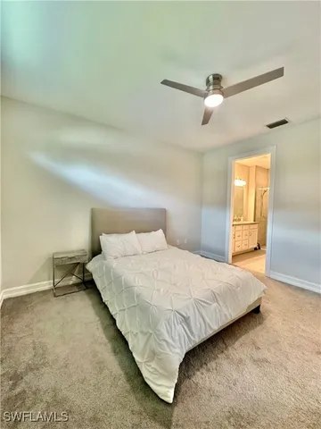 a bathroom with a double vanity sink mirror double and shower