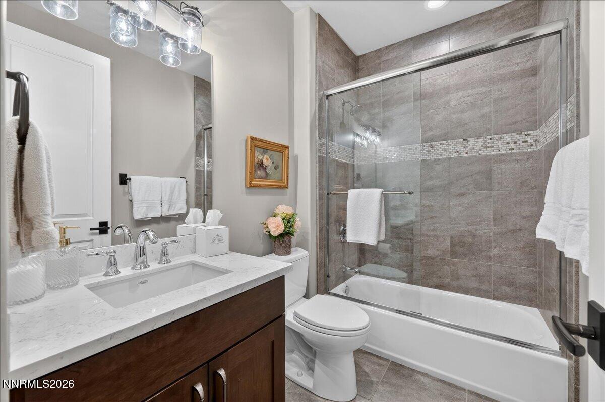 5096 Bordeaux Court Reno, NV 89511 - Photo 45 of 70 a bathroom with a sink a toilet and shower