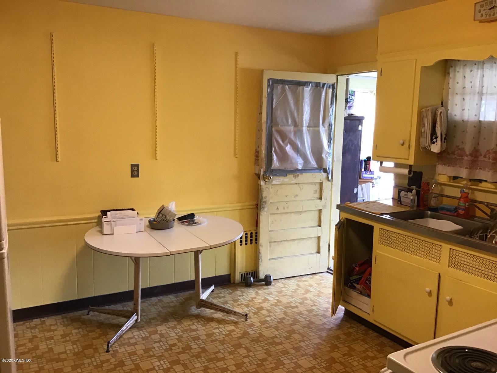 36 Sheep Hill Road Riverside, CT 06878 - Photo 7 of 16 a bathroom with a sink and a mirror