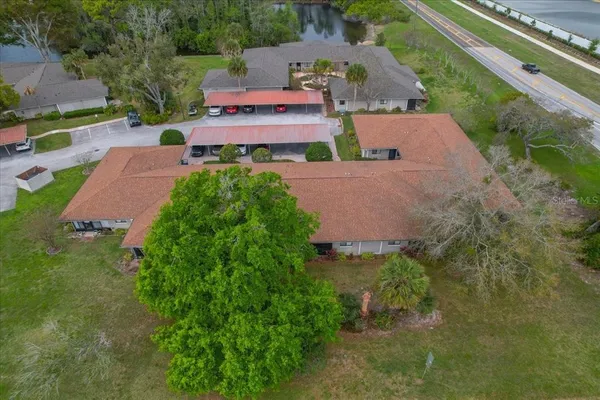 an aerial view of a house with a garden