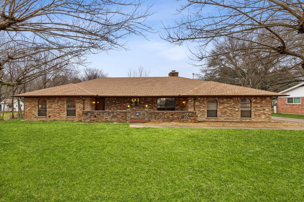 706 9th Street Terrell, TX 75160 - Photo 1 of 1 a view of a house with a yard
