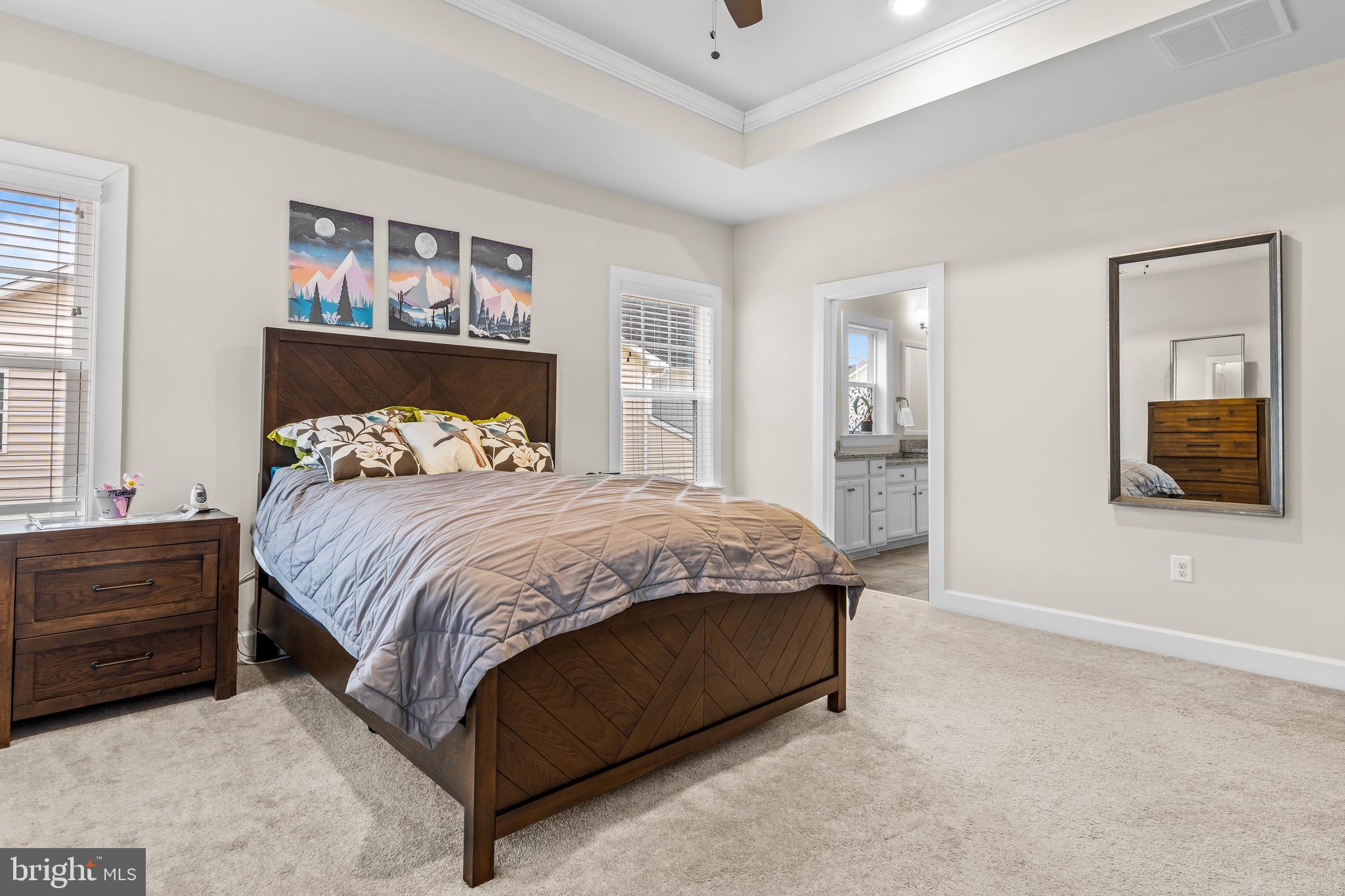 734 Quarry Point Road Malvern, PA 19355 - Photo 16 of 32 a bedroom with a bed and a painting on the wall