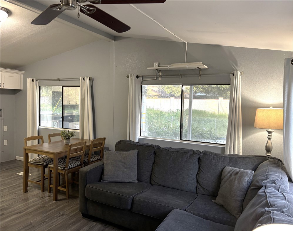 21515 Placerita Canyon Road, Unit 26 Newhall, CA 91321 - Photo 10 of 19 a living room with furniture and a window