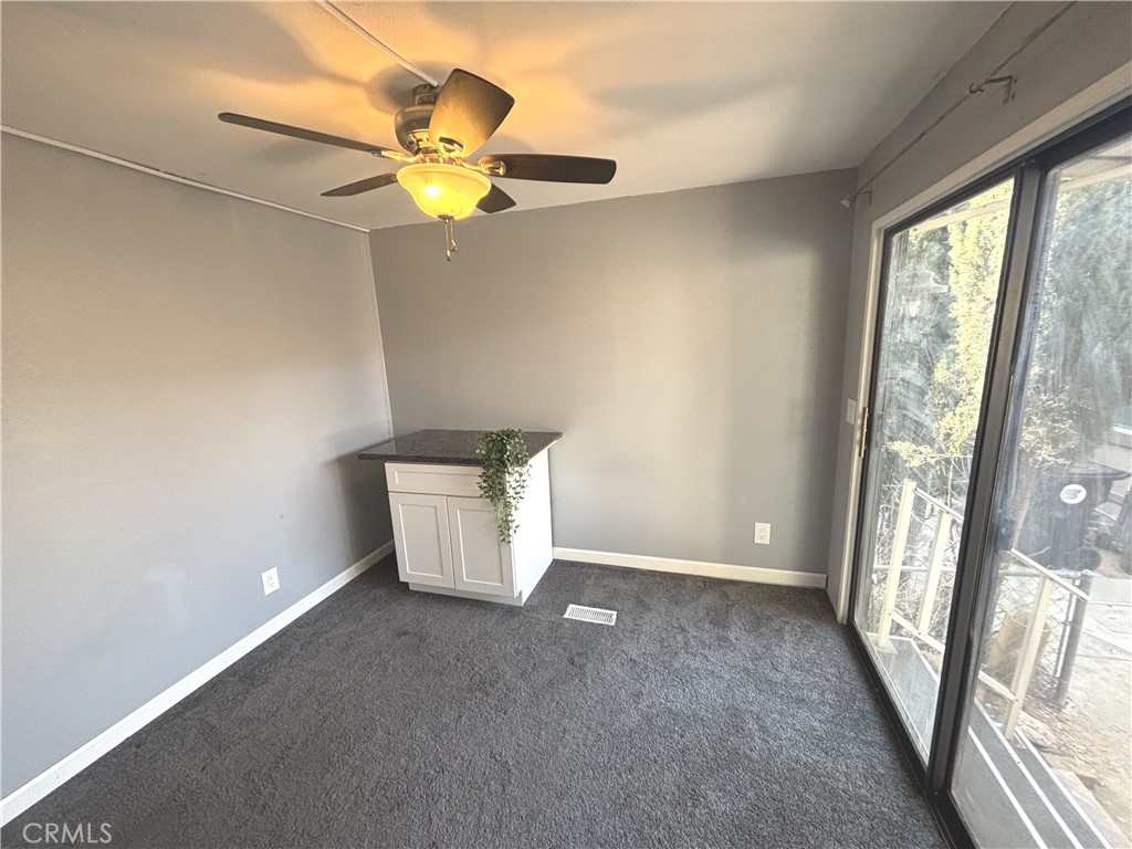 21515 Placerita Canyon Road, Unit 26 Newhall, CA 91321 - Photo 13 of 19 a view of an empty room with a window