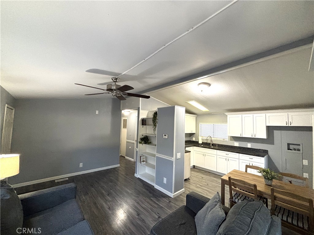 21515 Placerita Canyon Road, Unit 26 Newhall, CA 91321 - Photo 19 of 19 a kitchen with stainless steel appliances granite countertop a refrigerator and a stove top oven