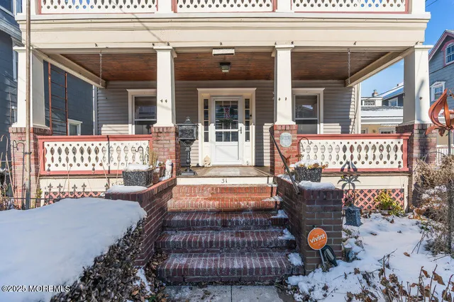 a view of a balcony with wooden floor